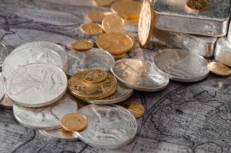 Gold and silver bars with coins like those traded at Dallas and Texas coin shows
